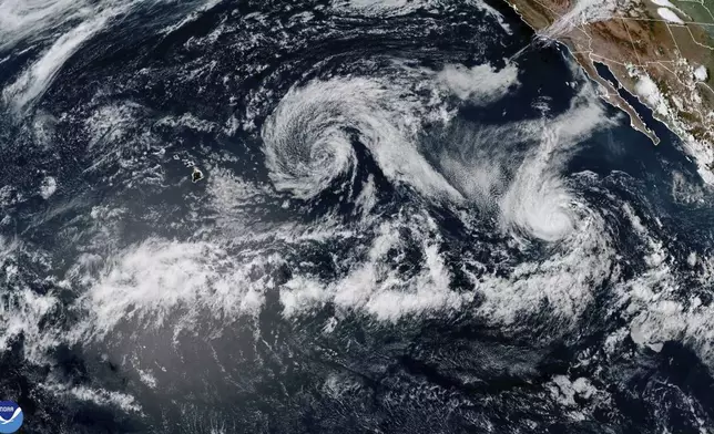 This satellite photo provided by NOAA shows Tropical Storm Henriette in the Pacific on Monday, Aug. 4, 2025. (NOAA via AP)