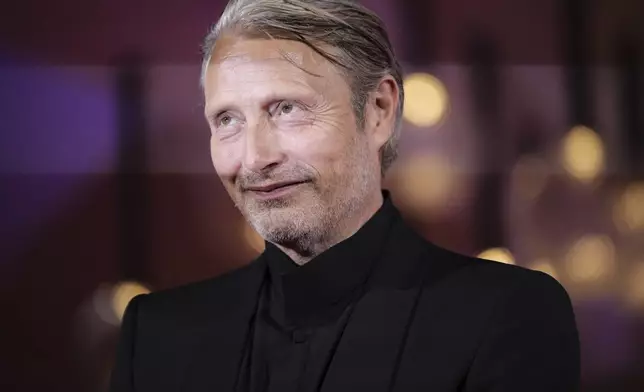 Mads Mikkelsen poses for photographers at the red carpet for the film 'The Last Viking' during the 82nd edition of the Venice Film Festival in Venice, Italy, on Saturday, Aug. 30, 2025. (Photo by Alessandra Tarantino/Invision/AP)