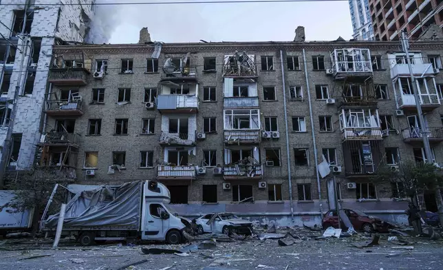 A residential building is seen damaged by a Russian strike on residential neighbourhood in Kyiv, Ukraine, on Thursday, Aug. 28, 2025. (AP Photo/Evgeniy Maloletka)