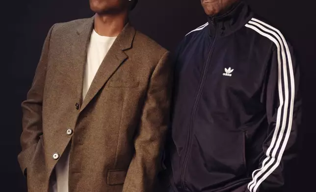 A$AP Rocky, left, and Denzel Washington pose for a portrait to promote "Highest 2 Lowest" on Sunday, Aug. 10, 2025, in New York. (Photo by Drew Gurian/Invision/AP)