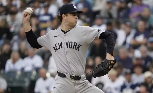 New York Yankees pitcher Cam Schlittler throws the ball against the Chicago White Sox during the first inning of a baseball game Saturday, Aug. 30, 2025, in Chicago. (AP Photo/David Banks)