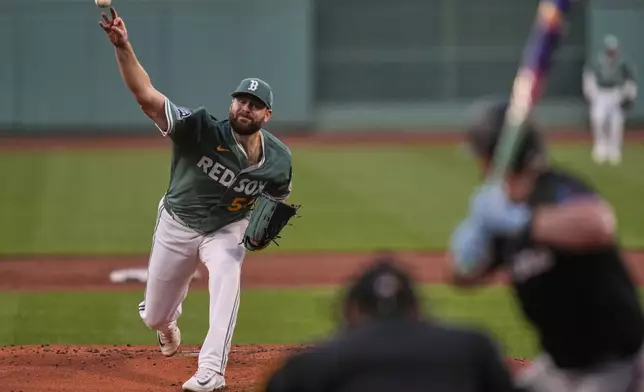 Boston Red Sox pitcher Lucas Giolito delivers during the first inning of a baseball game against the Miami Marlins at Fenway Park, Friday, Aug. 15, 2025, in Boston. (AP Photo/Charles Krupa)