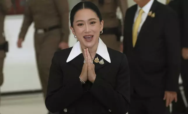 Thailand's suspended Prime Minister Paetongtarn Shinawatra arrives at Constitution Court to give testimony in Bangkok, Thailand, Thursday, Aug. 21, 2025. (AP Photo/Sakchai Lalit)