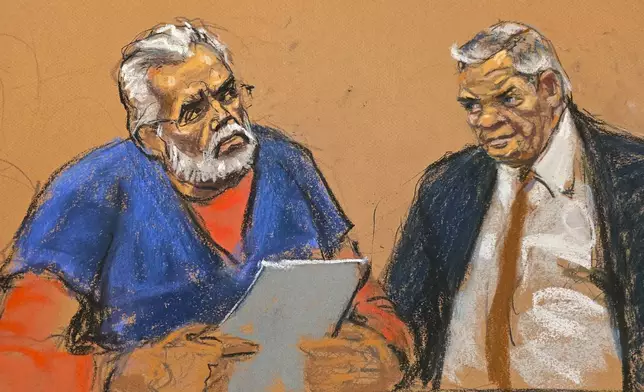 "El Mayo" Zambada speaks to Judge Brian Cogan (not pictured) in Brooklyn federal court, as his defense attorney Frank Perez looks on, Monday, Aug. 25, 2025, in New York. (Jane Rosenberg via AP)