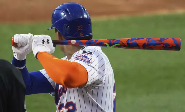 New York Mets outfielder Juan Soto (22) uses his Players' Weekend custom bat during the first inning of the Little League Classic baseball game against the Seattle Mariners at Bowman Field in Williamsport, Pa., Sunday, Aug. 17, 2025. (AP Photo/Gene J. Puskar)