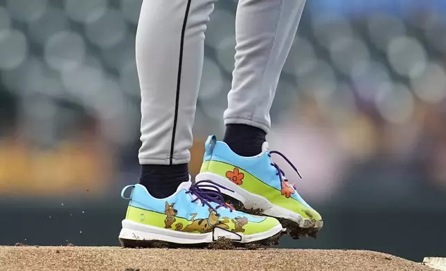 The cleats worn by Detroit Tigers starting pitcher Tarik Skubal (29) are pictured during the first inning of a baseball game against the Minnesota Twins Thursday, Aug. 14, 2025, in Minneapolis. (AP Photo/Abbie Parr)