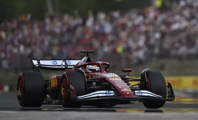 Ferrari driver Charles Leclerc of Monaco steers his car during the qualifying session for the Hungarian Formula One Grand Prix at the Hungaroring racetrack in Mogyorod, Hungary, Saturday, Aug. 2, 2025. (AP Photo/Denes Erdos)