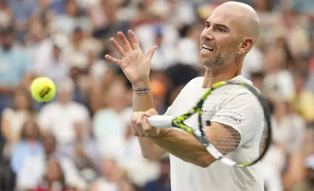 Adrian Mannarino, of France, returns a shot to Ben Shelton, of the United States, during the third round of the U.S. Open tennis championships, Friday, Aug. 29, 2025, in New York. (AP Photo/Kirsty Wigglesworth)