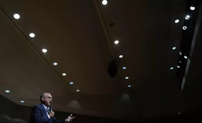 Republican Rep. Mark Alford addresses attendees at a town hall, Monday, Aug. 25, 2025, in Bolivar, Mo. (AP Photo/Charlie Riedel)