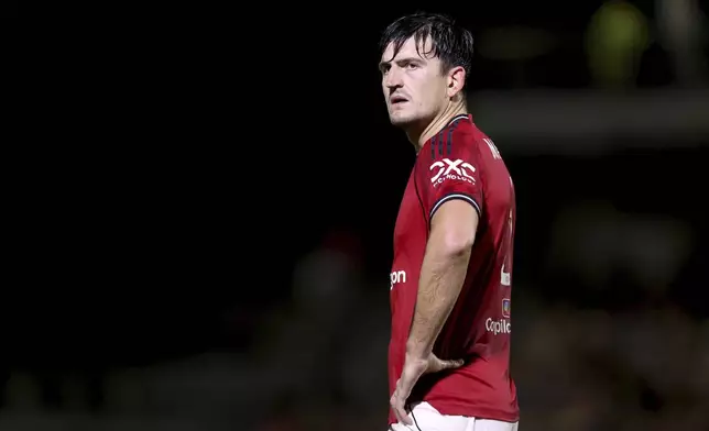 Manchester United's Harry Maguire reacts during an English League Cup second round soccer match against Grimsby Town, Wednesday, Aug. 27, 2025, at Hill Blundell Park in Grimsby, England. (Nigel French/PA via AP)