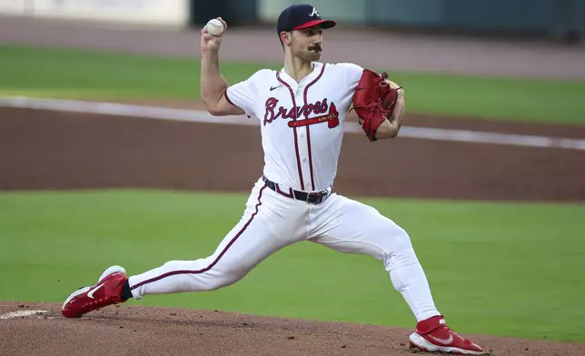 Atlanta Braves pitcher Spencer Strider delivers in the first inning of a baseball game against the Milwaukee Brewers, Wednesday, Aug. 6, 2025, in Atlanta. (AP Photo/Colin Hubbard)