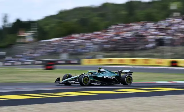 Aston Martin driver Felipe Drugovich of Brazil steers his car during the first free practice at the Hungaroring racetrack in Mogyorod, Hungary, Friday, Aug. 1, 2025, ahead of the Hungarian Formula One Grand Prix. (AP Photo/Denes Erdos)