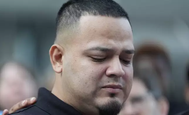 Kilmar Abrego Garcia attends a protest rally at the Immigration and Customs Enforcement field office in Baltimore, Monday, Aug. 25, 2025, to support Abrego Garcia. (AP Photo/Stephanie Scarbrough)