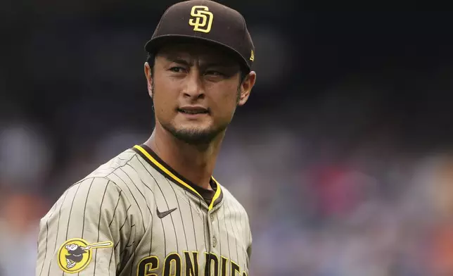 San Diego Padres starting pitcher Yu Darvish walks off the mound during the second inning of a baseball game against the Seattle Mariners, Wednesday, Aug. 27, 2025, in Seattle. (AP Photo/Lindsey Wasson)