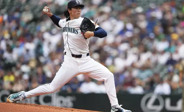 Seattle Mariners starting pitcher Bryan Woo throws during the second inning of a baseball game against the San Diego Padres, Wednesday, Aug. 27, 2025, in Seattle. (AP Photo/Lindsey Wasson)