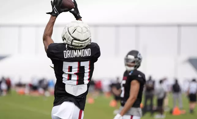 Atlanta Falcons wide receiver Dylan Drummond (81) works out during a joint NFL football practice between the Atlanta Falcons and the Tennessee Titans, Wednesday, Aug. 13, 2025, in Flowery Branch, Ga. (AP Photo/Mike Stewart)
