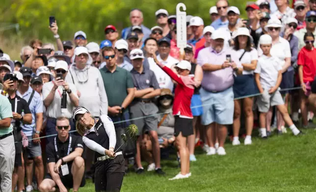 Canada's Brooke Henderson chips onto the green of the fifth hole during the fourth round of the CPKC Women's Open at the Mississauga Golf and Country Club in Mississauga, Ontario, Sunday, Aug. 24, 2025. (Thomas Skrlj/The Canadian Press via AP)