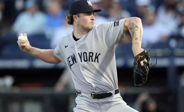 New York Yankees pitcher Cam Schlittler delivers to the Tampa Bay Rays during the first inning of a baseball game Wednesday, Aug. 20, 2025, in Tampa, Fla. (AP Photo/Chris O'Meara)