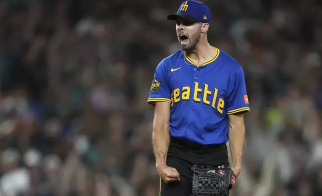 Seattle Mariners relief pitcher Matt Brash reacts to earning the save in a win against the Tampa Bay Rays in a baseball game Friday, Aug. 8, 2025, in Seattle. (AP Photo/Lindsey Wasson)