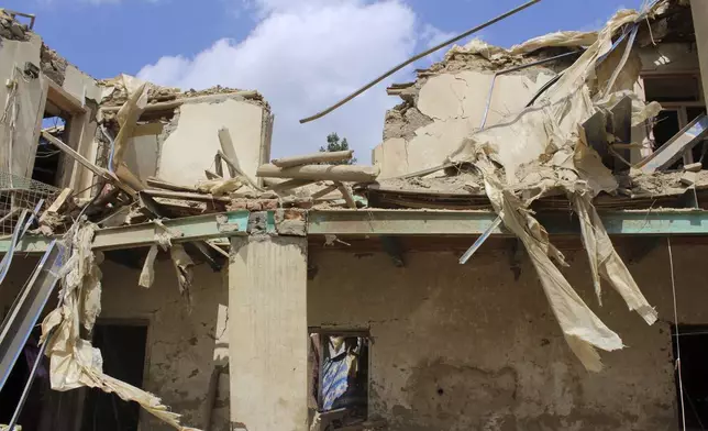THIS CORRECTS THE CASUALTY FIGURES AS PROVIDED BY AFGHAN OFFICIALS - A building destroyed in what Taliban authorities said was a Pakistani deadly drone attack is seen in Spera district of Khost province, Afghanistan, Thursday, Aug. 28, 2025. (AP Photo/Saifullah Zahir)