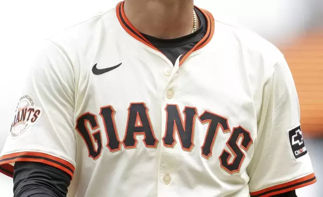 San Francisco Giants' Willy Adames reacts to being called out on strikes in ninth inning during a baseball game against the San Diego Padres at Oracle Park in San Francisco, Wednesday, Aug. 13, 2025. (Scott Strazzante/San Francisco Chronicle via AP)