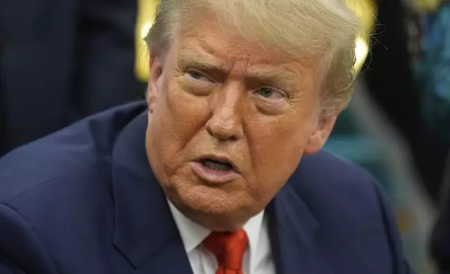 FILE - President Donald Trump answers questions from reporters as he meets with Congo's Foreign Minister Therese Kayikwamba Wagner, and Rwanda's Foreign Minister Olivier Nduhungirehe, Friday, June 27, 2025, in the Oval Office at the White House in Washington. (AP Photo/Manuel Balce Ceneta, File)