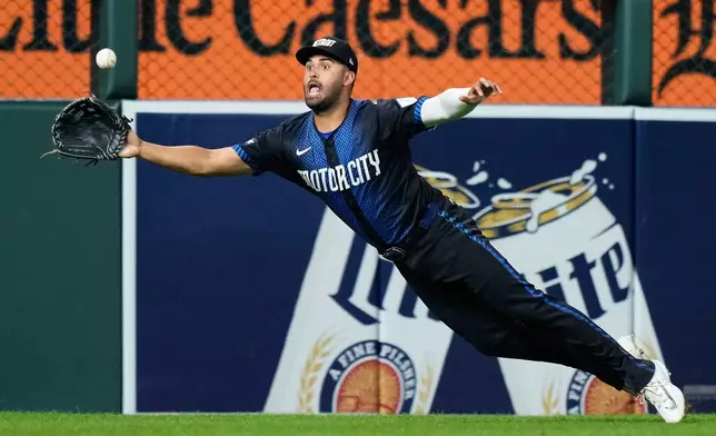 Detroit Tigers left fielder Riley Greene makes a leaping catch on a flyout hit by Los Angeles Angels' Zach Neto during the seventh inning of a baseball game Friday, Aug. 8, 2025, in Detroit. (AP Photo/Ryan Sun)