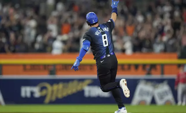 Detroit Tigers' Matt Vierling runs the bases after hitting a go-ahead three-run home run during the eighth inning of a baseball game against the Los Angeles Angels, Friday, Aug. 8, 2025, in Detroit. (AP Photo/Ryan Sun)