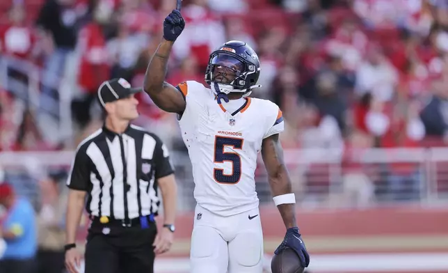 Denver Broncos wide receiver Trent Sherfield Sr. (5) celebrates after a touchdown catch during the first half of a preseason NFL football game San Francisco 49ers, Saturday, Aug. 9, 2025, in Santa Clara, Calif. (AP Photo/Kelley L Cox)