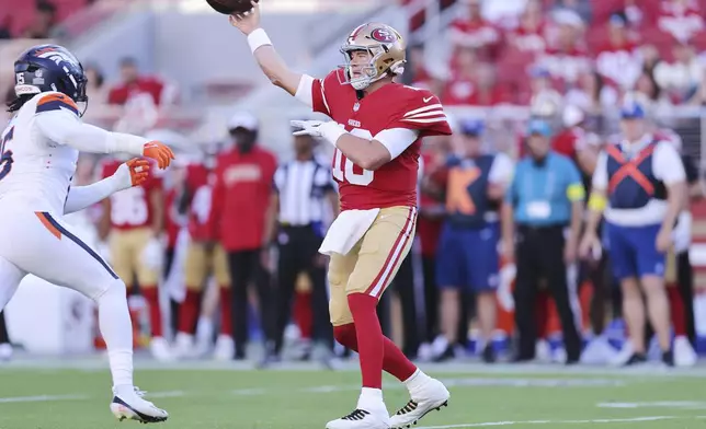 San Francisco 49ers quarterback Mac Jones (10) throws a pass during the first half of a preseason NFL football game against the Denver Broncos, Saturday, Aug. 9, 2025, in Santa Clara, Calif. (AP Photo/Kelley L Cox)