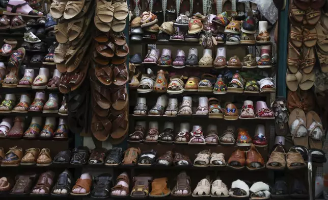 Sandals known as "huaraches" are displayed for sale at a market in Oaxaca, Mexico, Friday, Aug. 8, 2025. (AP Photo/Luis Alberto Cruz)