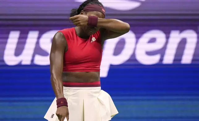 Coco Gauff, of the United States, appears to cry after winning the first set over Donna Vekic, of Croatia, during the second round of the U.S. Open tennis championships, Thursday, Aug. 28, 2025, in New York. (AP Photo/Frank Franklin II)