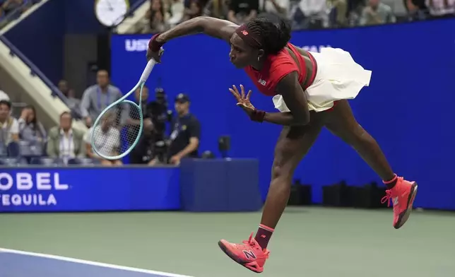 Coco Gauff, of the United States, serves to Donna Vekic, of Croatia, during the second round of the U.S. Open tennis championships, Thursday, Aug. 28, 2025, in New York. (AP Photo/Frank Franklin II)