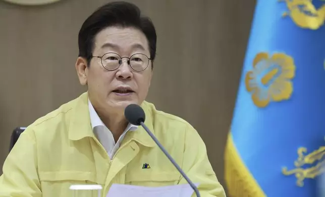 South Korean President Lee Jae Myung speaks during a cabinet meeting at the presidential office in Seoul, South Korea, Monday, Aug. 18, 2025. (Hong Hae-in/Yonhap via AP)