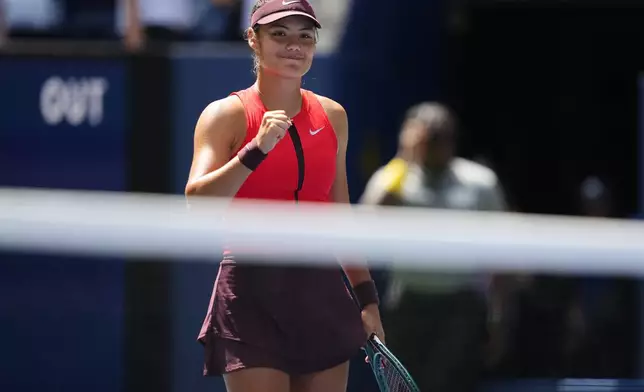 Emma Raducanu, of Great Britain, reacts after beating Ena Shibahara, of Japan, during the first round of the US Open tennis championships, Sunday, Aug. 24, 2025, in New York. (AP Photo/Yuki Iwamura)