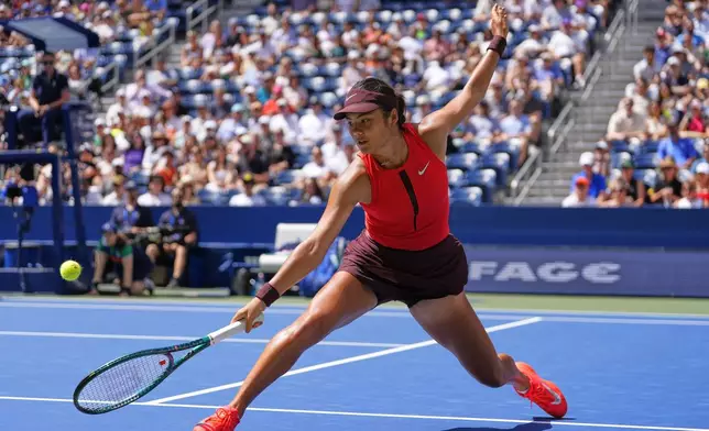 Emma Raducanu, of Great Britain, returns a shot to Ena Shibahara, of Japan, during the first round of the US Open tennis championships, Sunday, Aug. 24, 2025, in New York. (AP Photo/Yuki Iwamura)