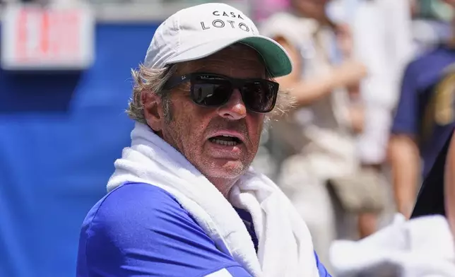 Francisco Roig, coach of Emma Raducanu, of Great Britain, watches play during the first round of the US Open tennis championships, Sunday, Aug. 24, 2025, in New York. (AP Photo/Yuki Iwamura)