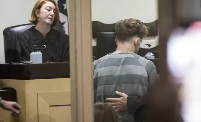 Andrew James McGann, charged with two counts of capital murder, appears in front of District Judge Terra Stephenson for his bond hearing at the Washington County Detention Center. Friday, Aug, 1, 2025, in Fayetteville, Ark. (AP Photo/Michael Woods)