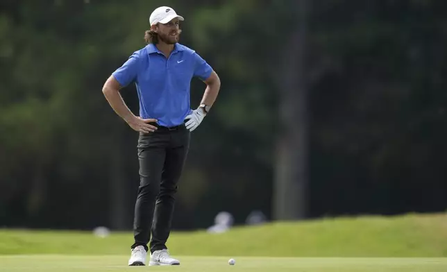 Tommy Fleetwood, of England, looks at his shot from the second fairway during the second round of the St. Jude Championship golf tournament Friday, Aug. 8, 2025, in Memphis, Tenn. (AP Photo/George Walker IV)