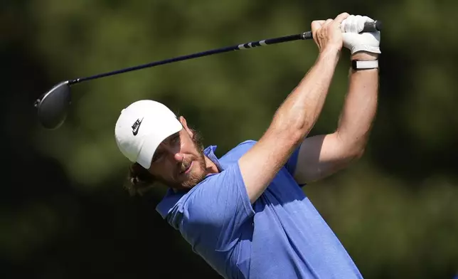 Tommy Fleetwood, of England, watches his tee shot on the seventh hole during the second round of the St. Jude Championship golf tournament Friday, Aug. 8, 2025, in Memphis, Tenn. (AP Photo/George Walker IV)