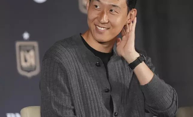 Son Heung-min, of South Korea, is introduced as a new member of Los Angeles FC during a press conference for the MLS soccer team Wednesday, Aug. 6, 2025, in Los Angeles. (AP Photo/Damian Dovarganes)
