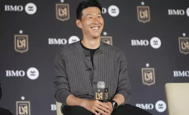 Son Heung-min, of South Korea, is introduced as a new member of Los Angeles FC during a press conference for the MLS soccer team Wednesday, Aug. 6, 2025, in Los Angeles. (AP Photo/Damian Dovarganes)