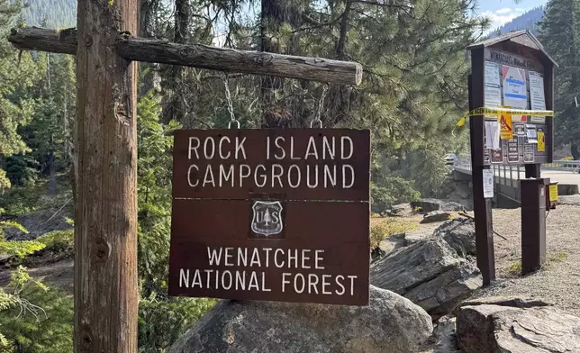 This photo provided by FBI Seattle shows the entrance to Rock Island Campground where multiple law enforcement agencies are participating in the search for Travis Decker, who was charged with murder and kidnapping, near Leavenworth, Wa. on Monday, August. 25, 2025. (FBI via AP)