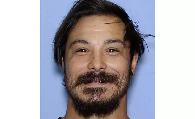 FILE - This undated photo provided by the Wenatchee Police Department shows Travis Caleb Decker, who is wanted in connection with the deaths of his three daughters. (Wenatchee Police Department via AP, File)