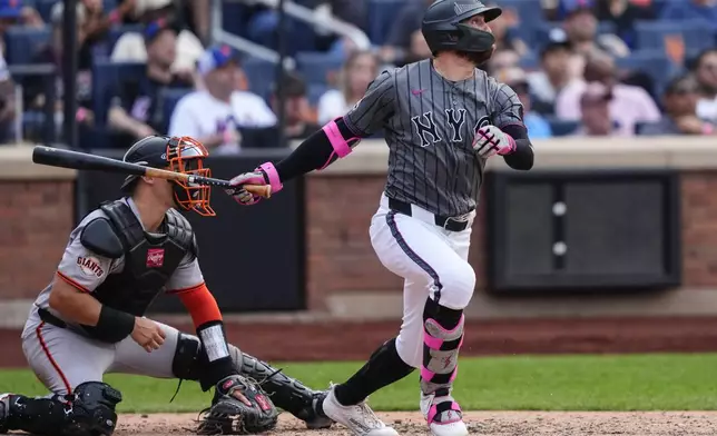 New York Mets' Brandon Nimmo (9) hits an RBI single during the sixth inning of a baseball game against the , Saturday, Aug. 2, 2025, in New York. (AP Photo/Yuki Iwamura)