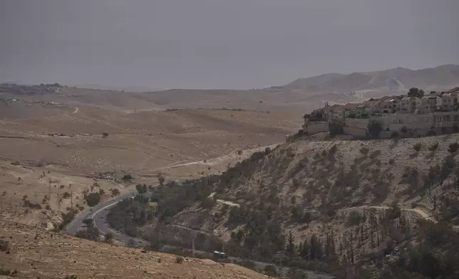 View of an area near Maale Adumim in the Israeli-occupied West Bank, where Israeli Finance Minister Bezalel Smotrich says housing units will be built as part of the E1 settlement project, Thursday, Aug. 14, 2025. (AP Photo/Ohad Zwigenberg)