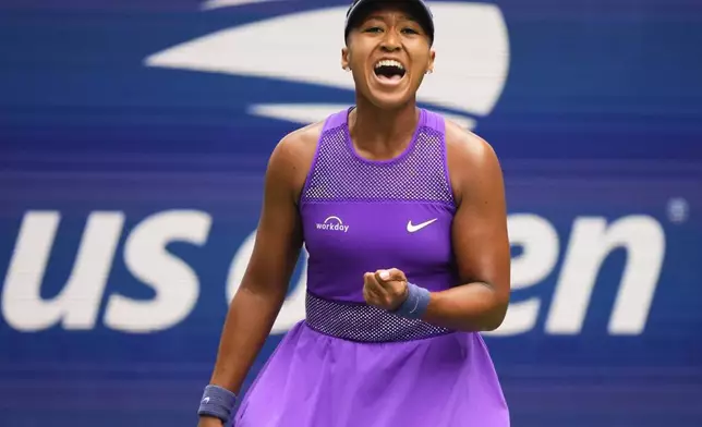 Naomi Osaka, of Japan, reacts after scoring a point against Hailey Baptiste, of the United States, during the second round of the U.S. Open tennis championships, Thursday, Aug. 28, 2025, in New York. (AP Photo/Yuki Iwamura)
