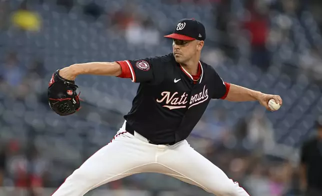Washington Nationals pitcher MacKenzie Gore throws during the first inning of a baseball game against the Athletics in Washington, Tuesday, Aug. 5, 2025. (AP Photo/Terrance Williams)