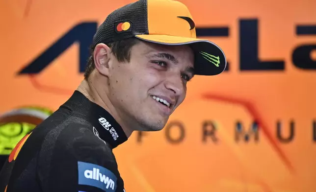 McLaren driver Lando Norris of Britain prepares for the second free practice at the Hungaroring racetrack in Mogyorod, Hungary, Friday, Aug. 1, 2025, ahead of the Hungarian Formula One Grand Prix. (AP Photo/Denes Erdos)