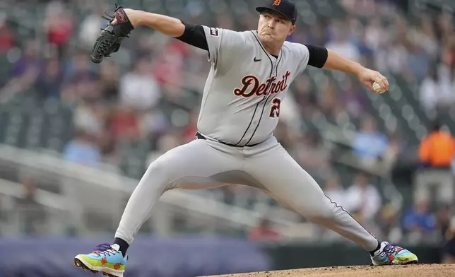 Detroit Tigers starting pitcher Tarik Skubal (29) delivers during the first inning of a baseball game against the Minnesota Twins Thursday, Aug. 14, 2025, in Minneapolis. (AP Photo/Abbie Parr)